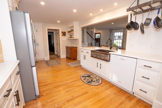 14 N Pleasant St, Dartmouth, MA 02748 - kitchen featuring dishwasher, freestanding refrigerator, white cabinetry, light wood-type flooring, and recessed lighting