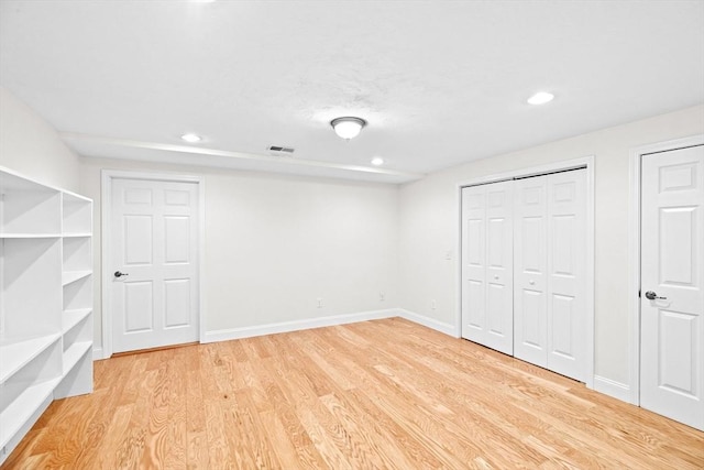 46 Walden Way Unit 46, Milford, MA 01757 - unfurnished bedroom with light wood-style floors, recessed lighting, and baseboards