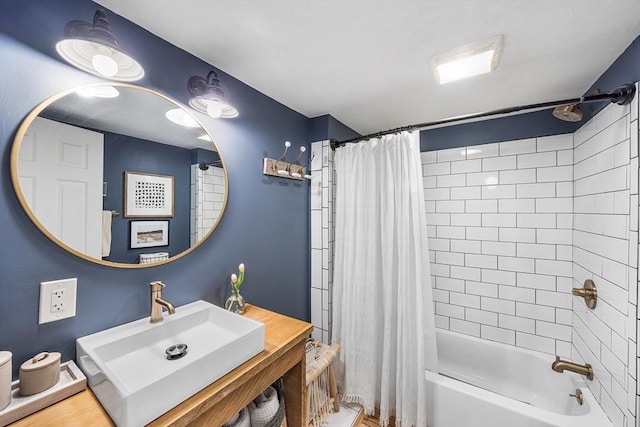 bathroom with shower / bath combo with shower curtain and vanity