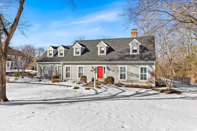 cape cod home with a chimney