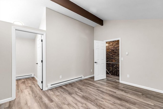 444 Loomis St, Westfield, MA 01085 - unfurnished bedroom with a baseboard heating unit, a walk in closet, wood finished floors, and a closet