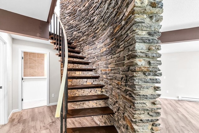 444 Loomis St, Westfield, MA 01085 - stairway with wood finished floors and baseboard heating