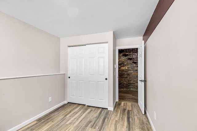444 Loomis St, Westfield, MA 01085 - unfurnished bedroom with wood finished floors and a closet