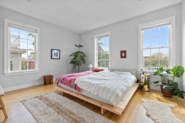 148 Winthrop Shore Dr Unit 4, Winthrop, MA 02152 - bedroom with wood finished floors and baseboards