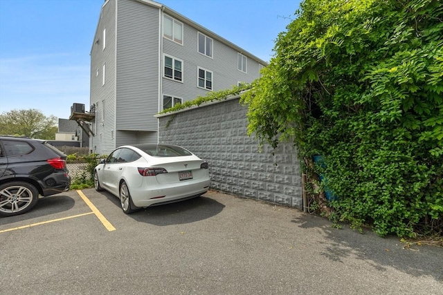 148 Winthrop Shore Dr Unit 4, Winthrop, MA 02152 - view of property exterior featuring uncovered parking