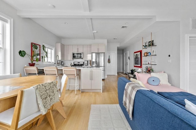148 Winthrop Shore Dr Unit 4, Winthrop, MA 02152 - living area featuring light wood-style flooring
