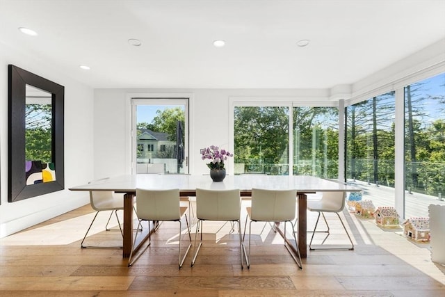 30 Whipple Rd, Lexington, MA 02420 - dining space with healthy amount of natural light, light wood finished floors, and recessed lighting