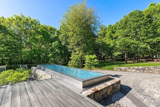 30 Whipple Rd, Lexington, MA 02420 - view of pool with an infinity pool and view of wooded area