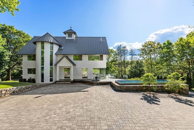 30 Whipple Rd, Lexington, MA 02420 - view of building exterior with an outdoor pool