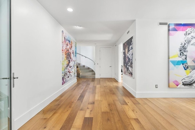 30 Whipple Rd, Lexington, MA 02420 - hallway featuring stairs, light wood-style flooring, and recessed lighting
