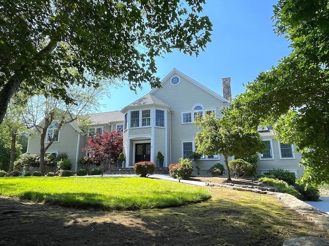 view of front of house with a front yard