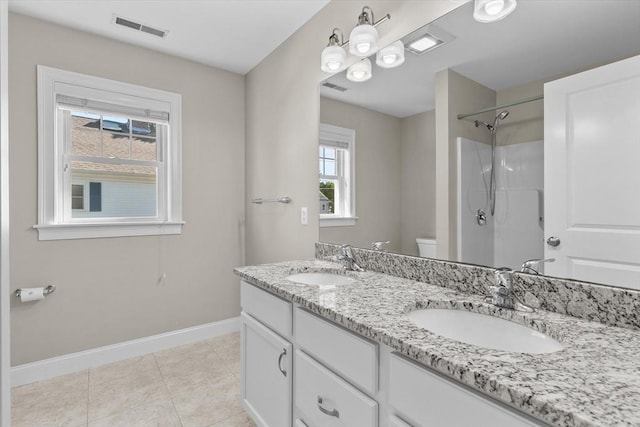 4 Emerald Way Unit 4, Salisbury, MA 01952 - full bathroom with double vanity, tile patterned floors, and a shower
