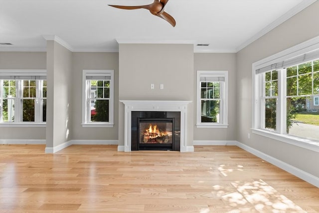 4 Emerald Way Unit 4, Salisbury, MA 01952 - unfurnished living room with wood finished floors, a glass covered fireplace, a ceiling fan, and ornamental molding