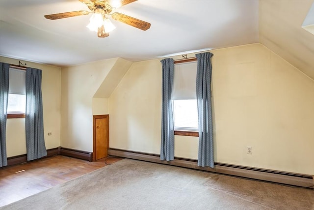 195 Hooper St, Tiverton, RI 02878 - bonus room with lofted ceiling, ceiling fan, carpet floors, and a baseboard heating unit