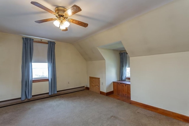195 Hooper St, Tiverton, RI 02878 - bonus room featuring carpet floors, lofted ceiling, baseboard heating, baseboards, and ceiling fan
