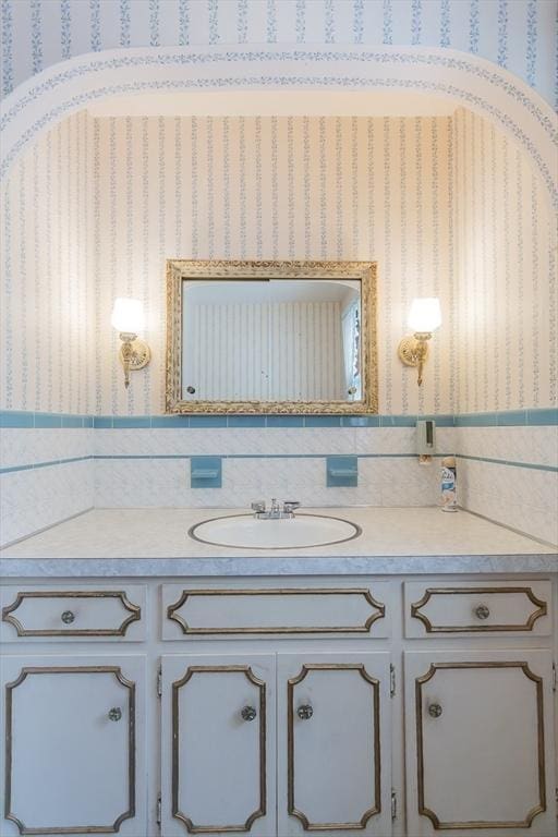 195 Hooper St, Tiverton, RI 02878 - bathroom with vanity and tile walls