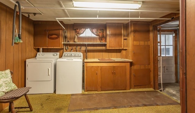 195 Hooper St, Tiverton, RI 02878 - laundry area featuring washer and clothes dryer, wooden walls, plenty of natural light, and carpet floors