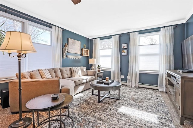 living area featuring a ceiling fan, baseboards, carpet floors, ornamental molding, and baseboard heating