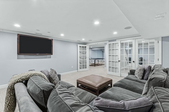 carpeted living room with baseboards, french doors, and recessed lighting