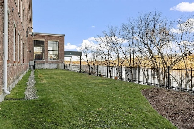view of yard with a fenced backyard