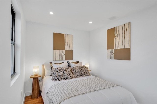 bedroom featuring hardwood / wood-style flooring