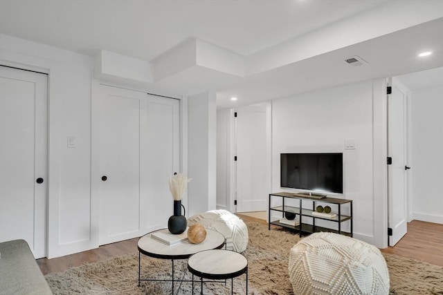 living room with wood-type flooring