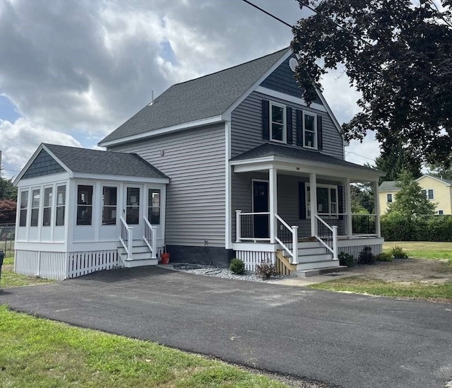 farmhouse inspired home with covered porch