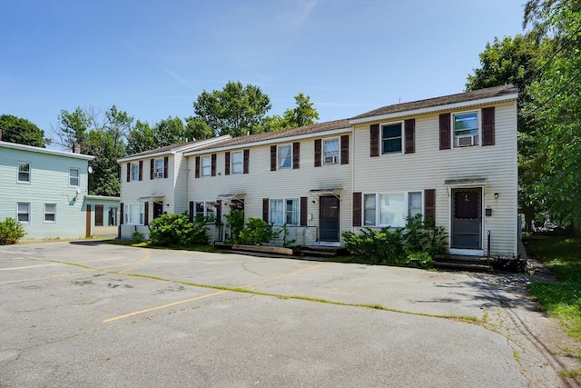25 Sutherland St, Lowell, MA 01850 - view of front of house with uncovered parking and cooling unit