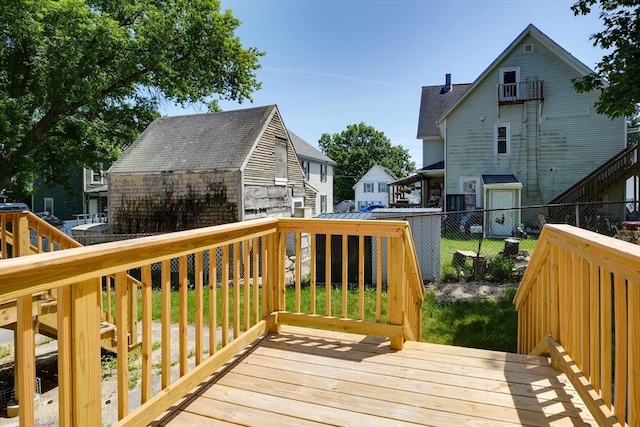 25 Sutherland St, Lowell, MA 01850 - deck featuring a fenced backyard and a residential view
