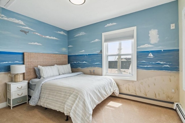 bedroom featuring carpet floors and a baseboard heating unit