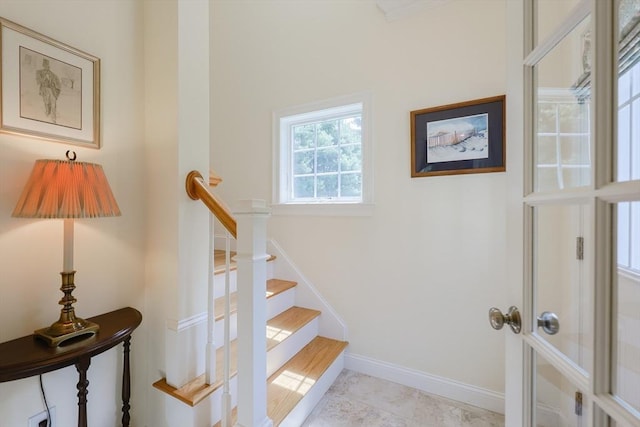 stairway with baseboards