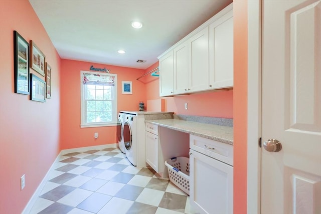 laundry room with separate washer and dryer, cabinet space, baseboards, recessed lighting, and light flooring
