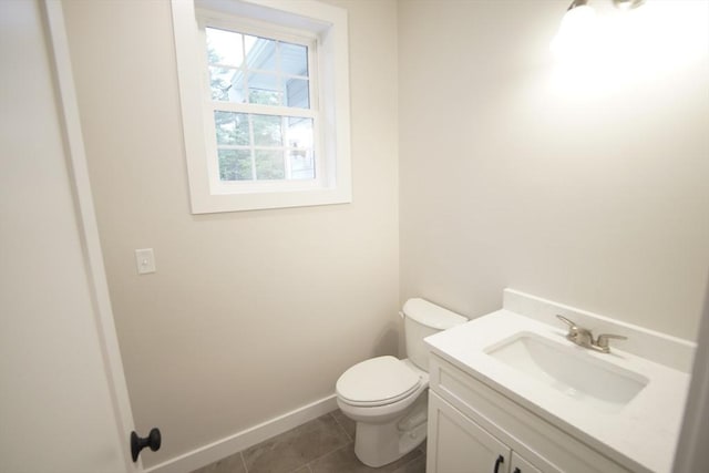 140 Tispaquin St, Middleboro, MA 02346 - bathroom with toilet, vanity, tile patterned flooring, and baseboards