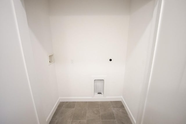 140 Tispaquin St, Middleboro, MA 02346 - laundry room featuring hookup for an electric dryer, washer hookup, baseboards, and dark tile patterned floors