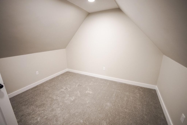140 Tispaquin St, Middleboro, MA 02346 - additional living space with carpet floors, lofted ceiling, and baseboards