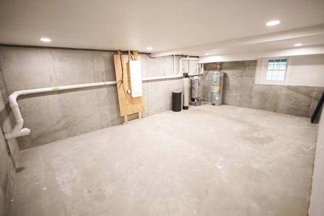 140 Tispaquin St, Middleboro, MA 02346 - below grade area featuring water heater and recessed lighting