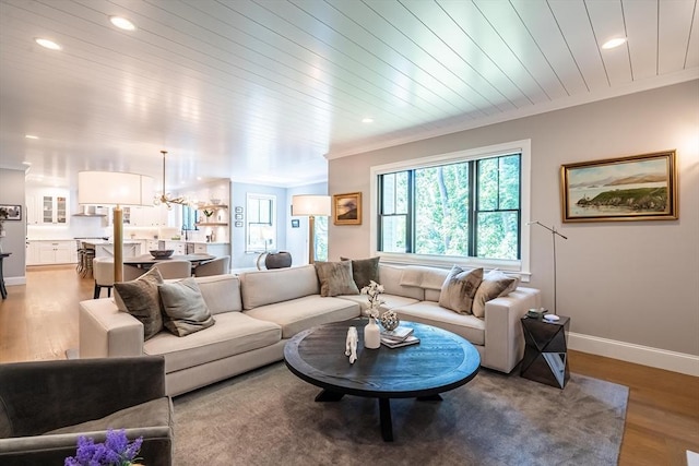 1 Putnam Rd, Bedford, MA 01730 - living area with a chandelier, wood finished floors, ornamental molding, and recessed lighting