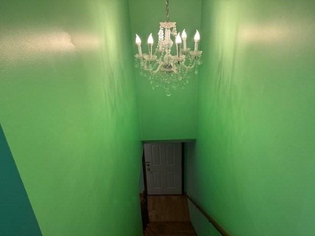 30 Wallace Cir Unit 30, Malden, MA 02148 - stairs featuring a chandelier and wood finished floors