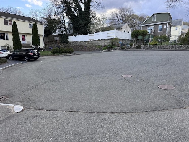 30 Wallace Cir Unit 30, Malden, MA 02148 - view of asphalt road featuring a residential view and curbs