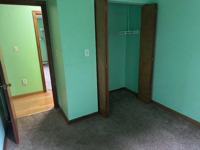 30 Wallace Cir Unit 30, Malden, MA 02148 - unfurnished bedroom with carpet, a closet, and baseboards