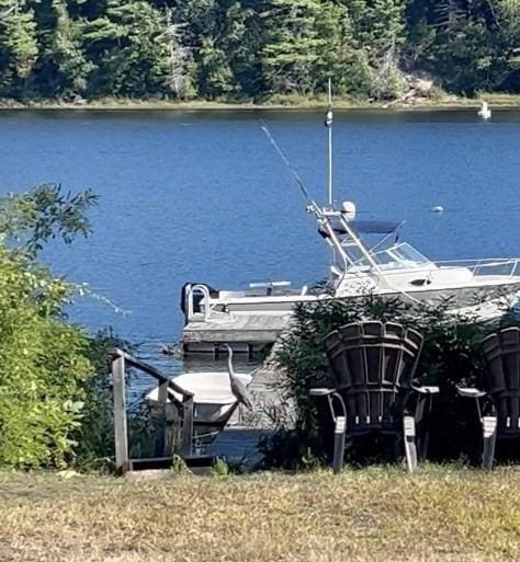 view of dock with a water view