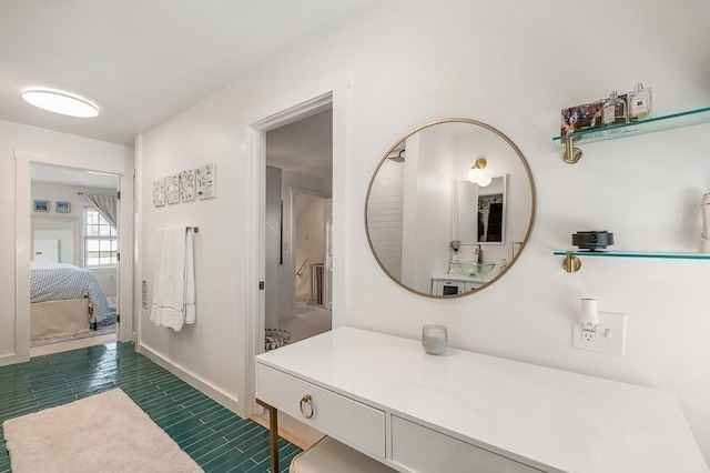 bathroom featuring baseboards