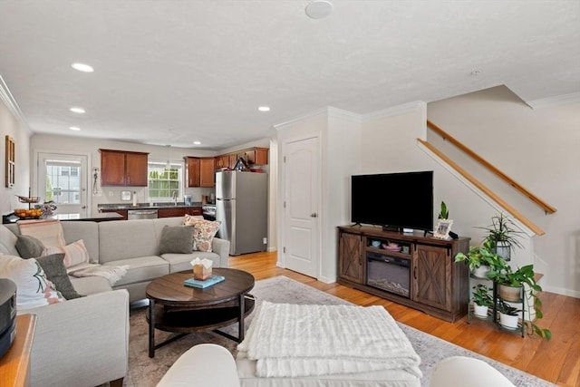 24 Merrimac Way Unit H, Tyngsborough, MA 01879 - living area featuring crown molding, recessed lighting, light wood-type flooring, and baseboards