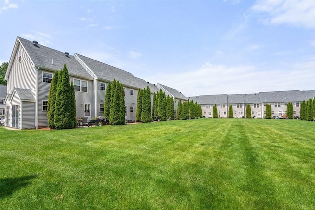 24 Merrimac Way Unit H, Tyngsborough, MA 01879 - view of green lawn featuring a residential view