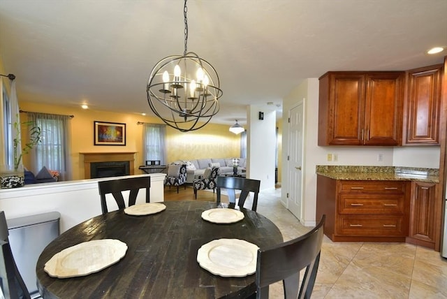 21 Hunt Dr, Stoughton, MA 02072 - dining area with a chandelier, a fireplace, and recessed lighting