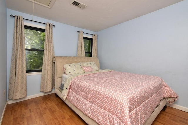 21 Hunt Dr, Stoughton, MA 02072 - bedroom with wood finished floors and attic access