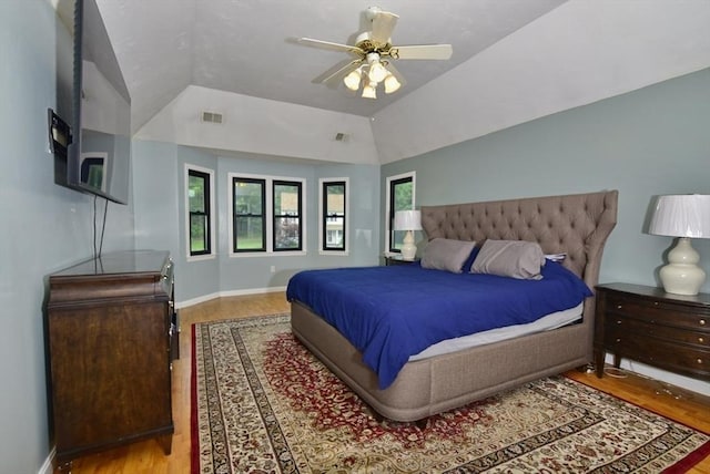 21 Hunt Dr, Stoughton, MA 02072 - bedroom featuring wood finished floors, vaulted ceiling, and ceiling fan