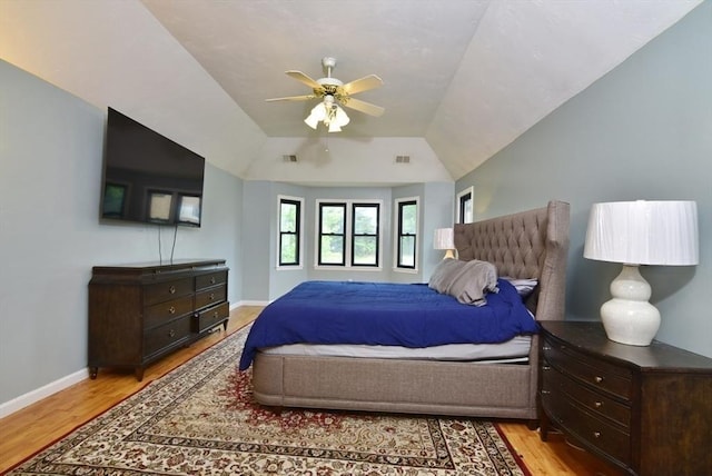 21 Hunt Dr, Stoughton, MA 02072 - bedroom with light wood-style floors, vaulted ceiling, and a ceiling fan