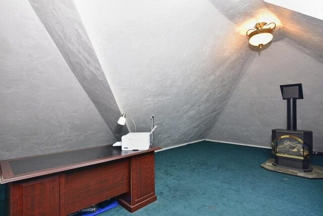 21 Hunt Dr, Stoughton, MA 02072 - unfurnished office with lofted ceiling, carpet, and a wood stove