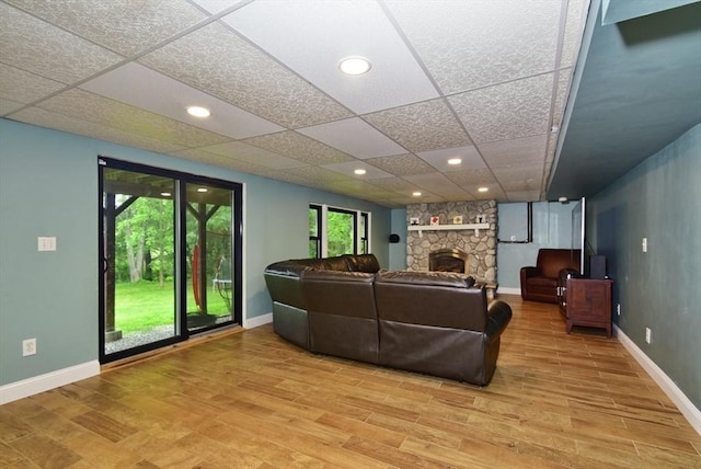 21 Hunt Dr, Stoughton, MA 02072 - living area with a fireplace, light wood-type flooring, a drop ceiling, and recessed lighting